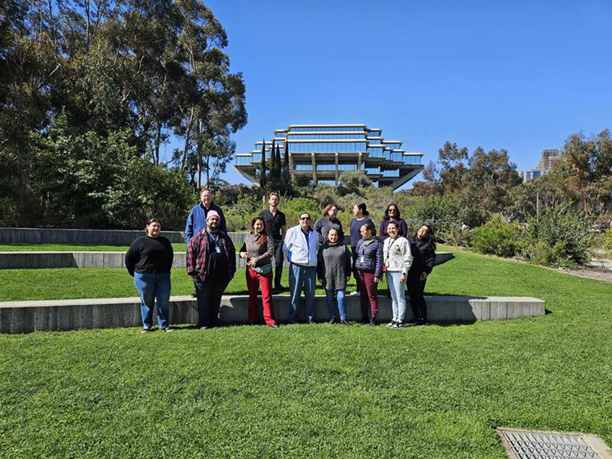 A photo of February hires in front of Geisel